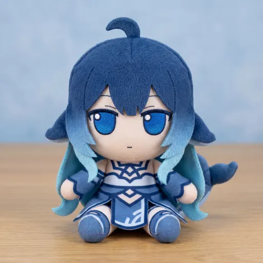 This one actually turned me into a plush, sitting up straight on a wooden desk, blue wall behind my blue hair…